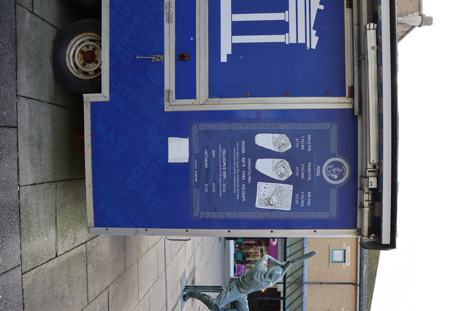 Close-up of custom hand-drawn illustrations for Greek food van menu in Hastings